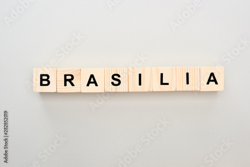 top view of wooden blocks with Brasilia lettering on grey background
