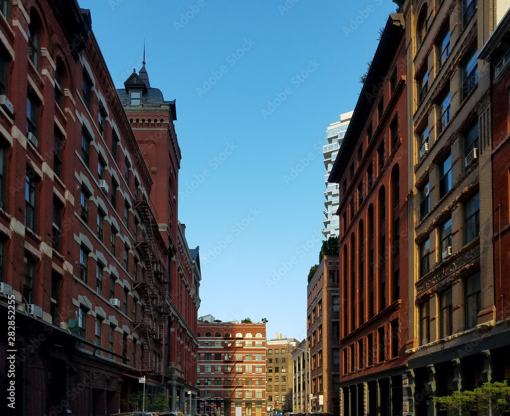 Fototapeta premium Historic buildings along Harrison Street in the Tribeca neighborhood of Manhattan in New York City