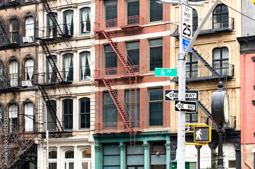 Photography Block of colorful old apartment buildings on 6th Avenue in the Tribeca neighborh