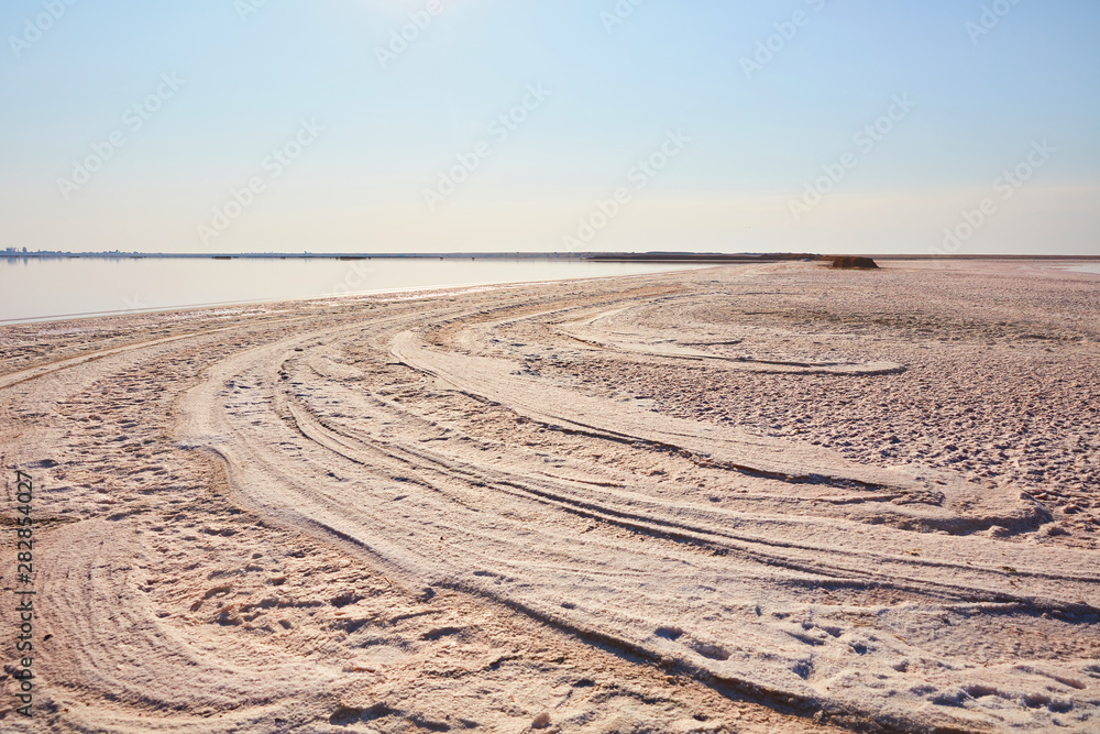 Naklejka premium The salt shore at sunset