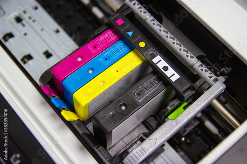 An ink cartridge or inkjet cartridge is a component of an inkjet printer that contains the ink four color © piyaphunjun