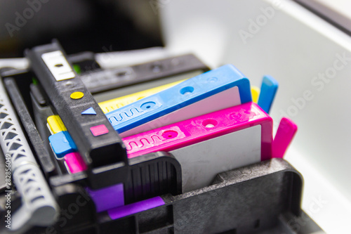 An ink cartridge or inkjet cartridge is a component of an inkjet printer that contains the ink four color © piyaphunjun