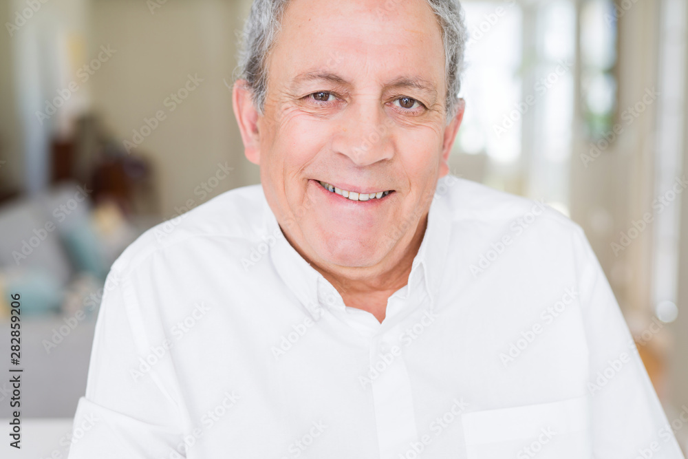 Handsome senior man smiling confident Handsome senior man smiling confident