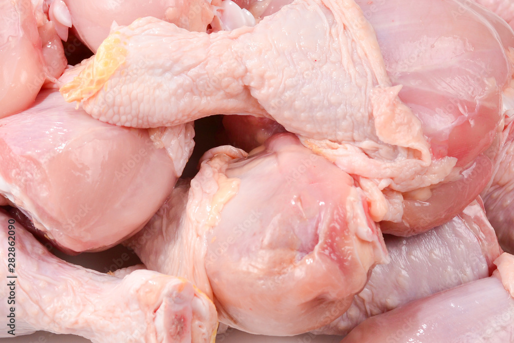 Tasty raw chicken legs. Top view. Tasty raw chicken legs. Top view.