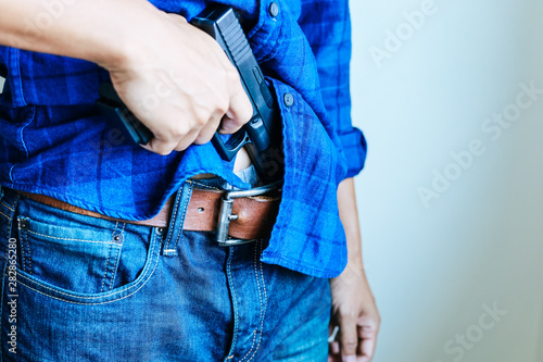 Bilde på lerret Man holding gunman concept.