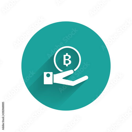White Hand holding Bitcoin icon isolated with long shadow. Blockchain technology, digital money market, cryptocoin wallet. Green circle button. Vector Illustration