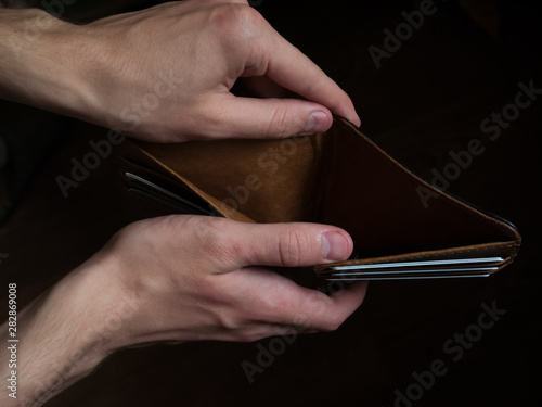 Man hand open an empty wallet close up