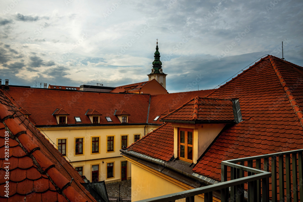 Red roofs, buildings and church in Uherske Hradiste.