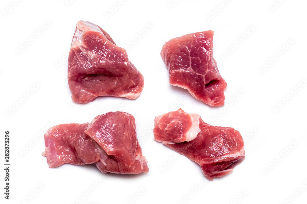 Cut pieces of raw meat pork, beef isolated on white Background Cut pieces of raw meat pork, beef isolated on white Background