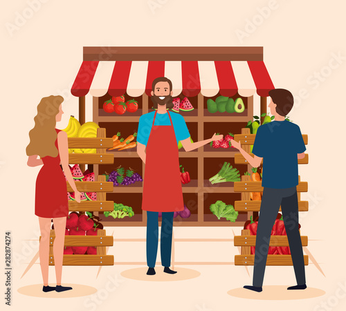 salesman in the natural store with man and woman customers