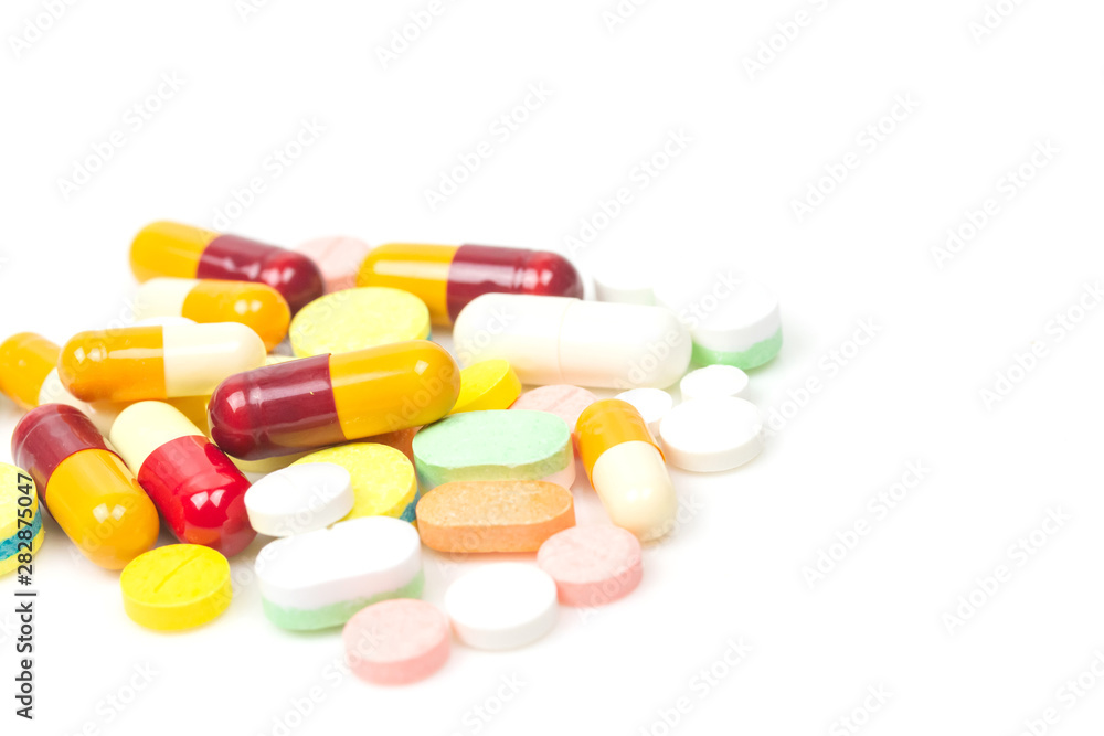 Colorful medicine pills isolated on white background.