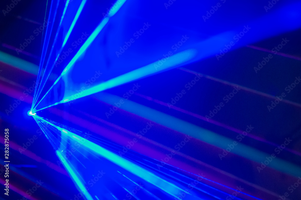 Laser beam on blue background Laser beam on blue background