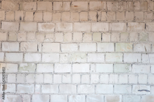 Brick wall. Texture of old white bricks.