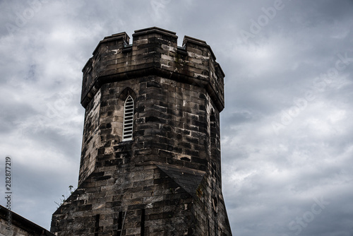 Watch tower of a penitentiary before a storm