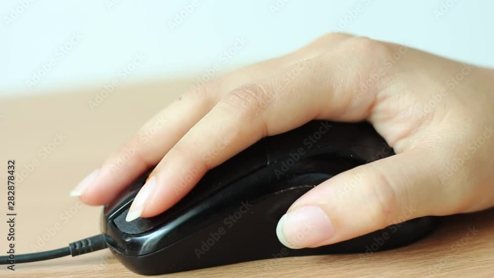 close up clicking mouse on office table. close up clicking mouse on office table.