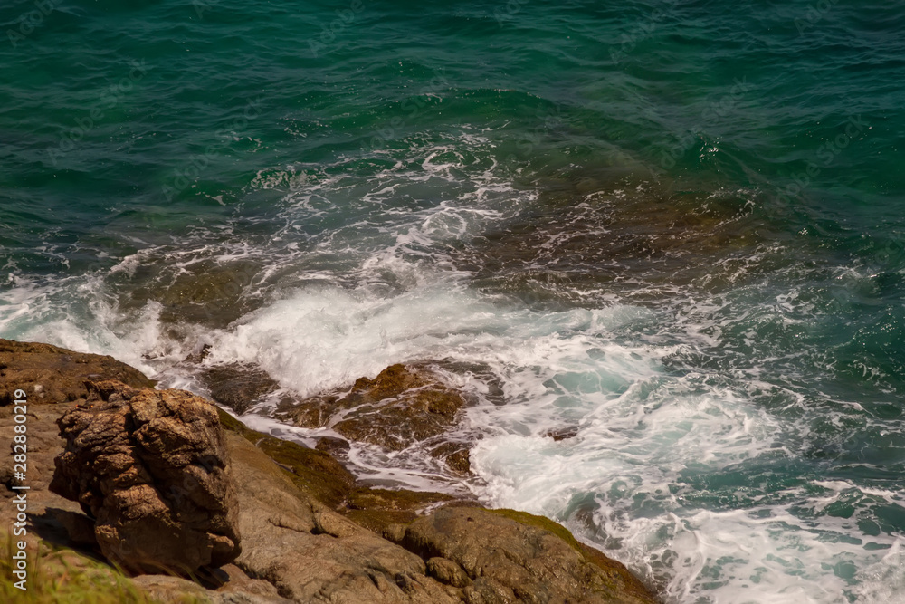 Rocks by the sea that were washed by waves