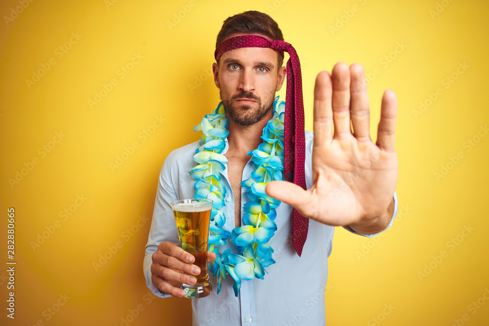 Hangover business man drunk and crazy for hangover wearing tie on head drinking beer with open hand doing stop sign with serious and confident expression, defense gesture Hangover business man drunk and crazy for hangover wearing tie on head drinking beer with open hand doing stop sign with serious and confident expression, defense gesture