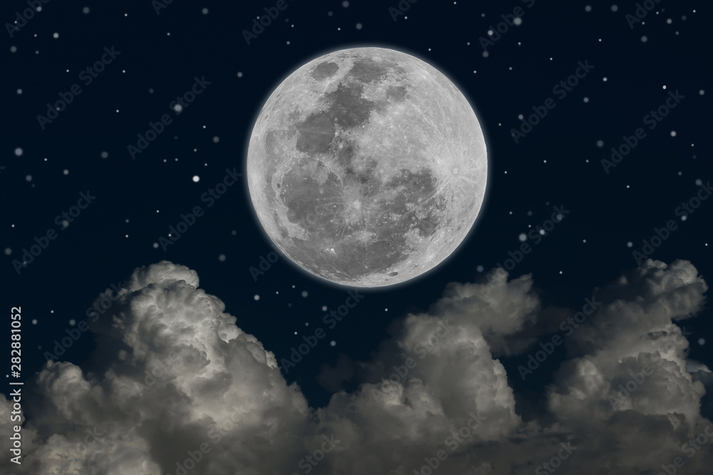 Full moon with white clouds at night. Full moon with white clouds at night.