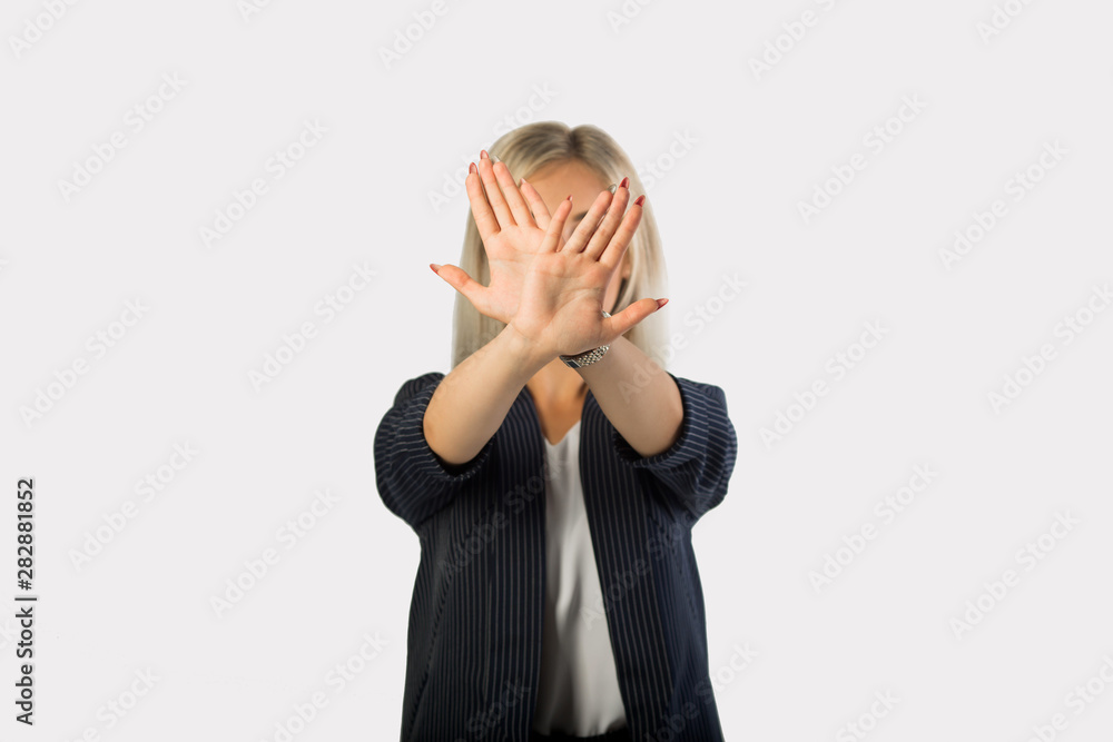 beautiful young woman in suit on white background with hand gesture beautiful young woman in suit on white background with hand gesture