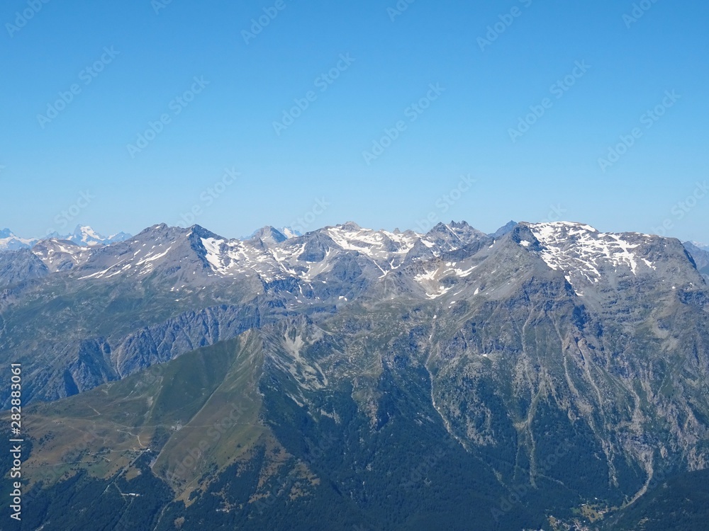 Nature, meadows and peaks that characterize the landscape of the Italian Alps in Val di Susa, near the village of 