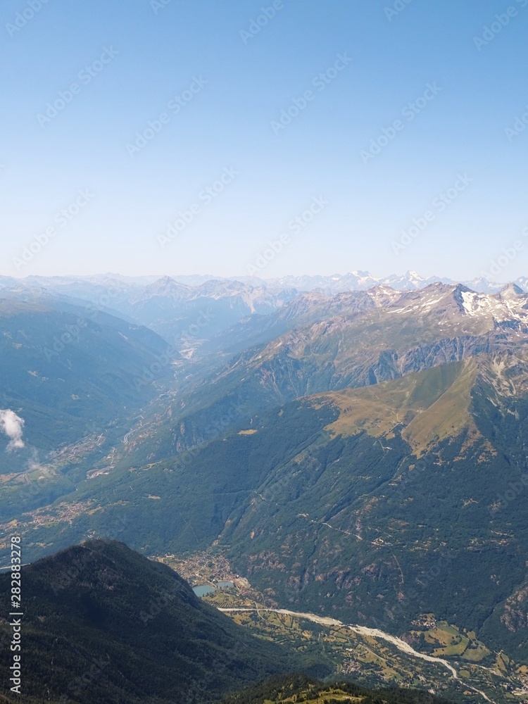 Nature, meadows and peaks that characterize the landscape of the Italian Alps in Val di Susa, near the village of 