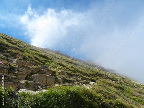 Nature, meadows and peaks that characterize the landscape of the Italian Alps in Val di Susa, near the village of 