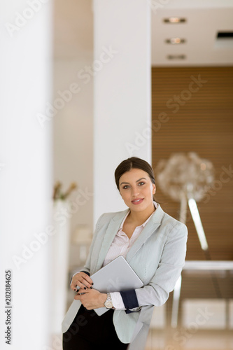 Young woman with a tablet i...