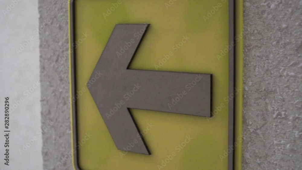 The Yellow Arrow On A Wall Specifies The Direction Of The Movement The Yellow Arrow On A Wall Specifies The Direction Of The Movement