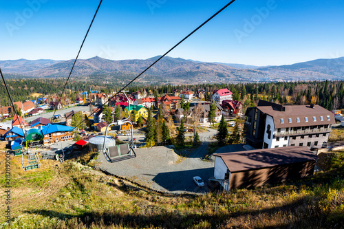 Beautiful view of mountain resort. A small town among the mountains. photo