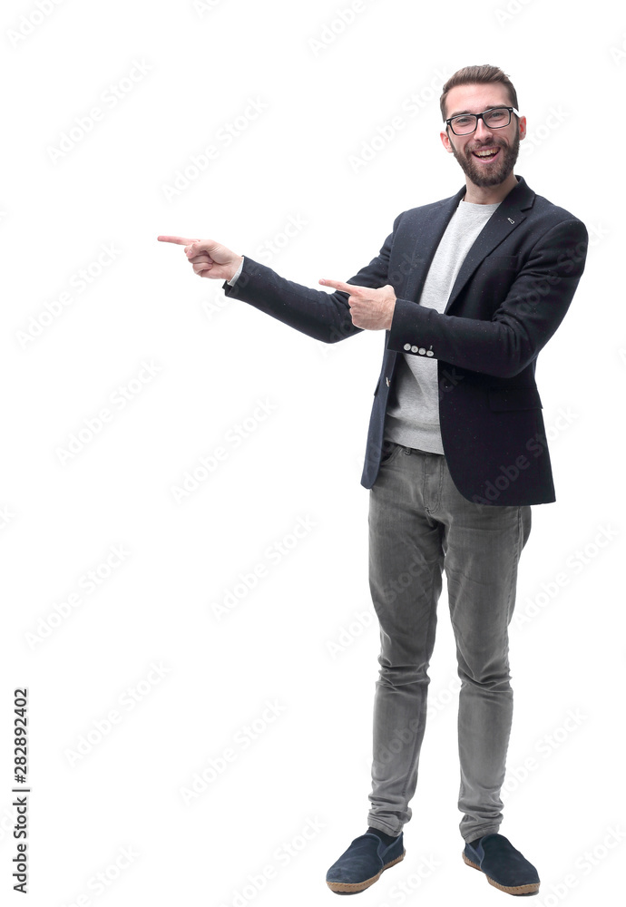 smiling business man pointing to the side at copy space smiling business man pointing to the side at copy space