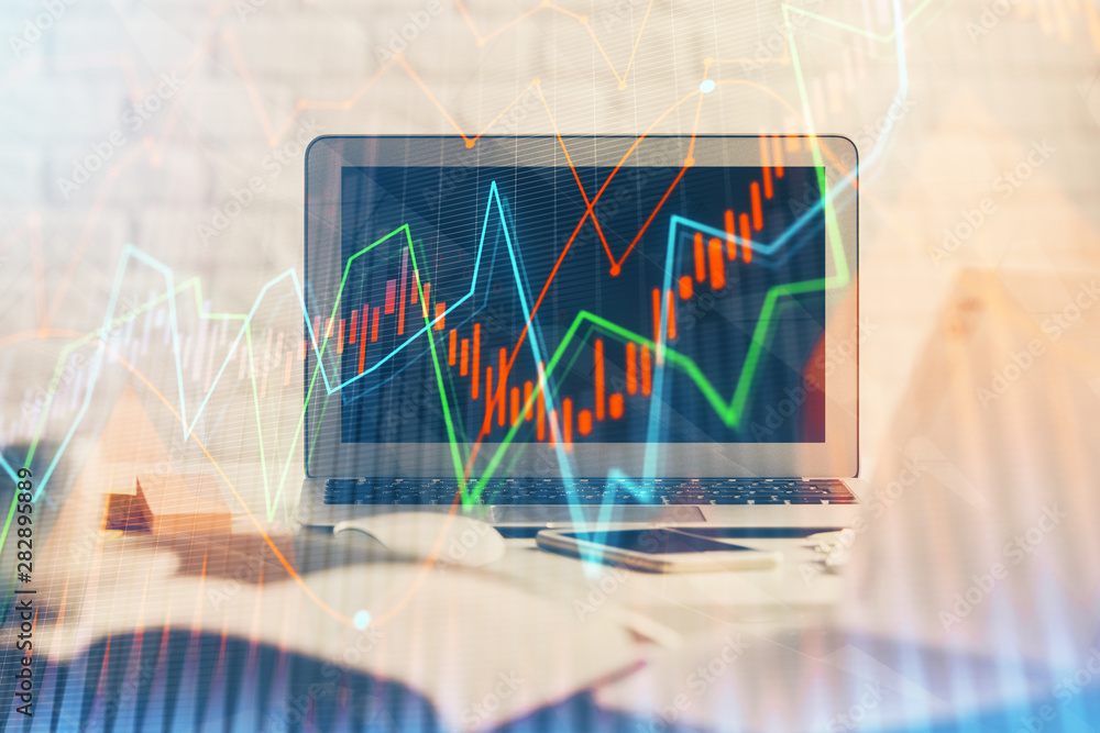 Stock market graph on background with desk and personal computer. Multi exposure. Concept of financial analysis. Stock market graph on background with desk and personal computer. Multi exposure. Concept of financial analysis.