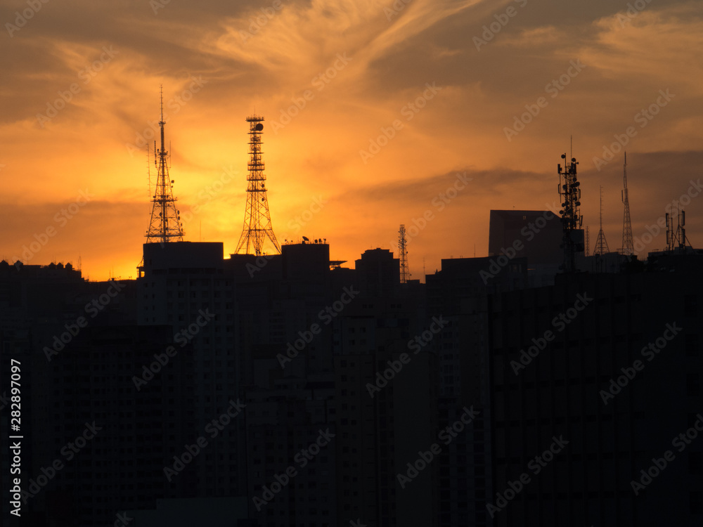São Paulo - São Paulo - Brasil - October 30 2015 - antenna towers at beautiful sunset