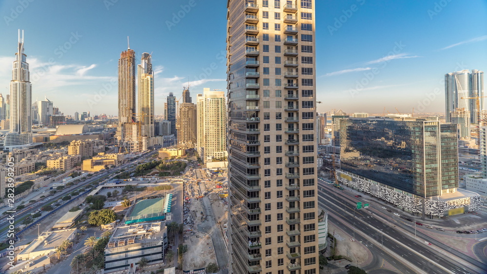 Beautiful skyline of Dubai downtown and Business bay with modern architecture during sunset.