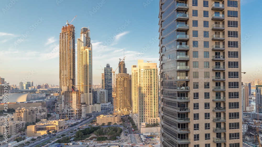 Fototapeta premium Beautiful skyline of Dubai downtown and Business bay with modern architecture during sunset.