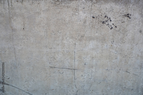 texture of gray concrete wall with scratches close up