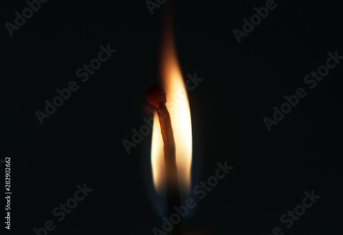 burning matches close-up on a black background