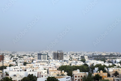 The predominantly low-rise homes, offices and other buildings in the Al Badi area of the Omani capital, Muscat on 8 August 2017