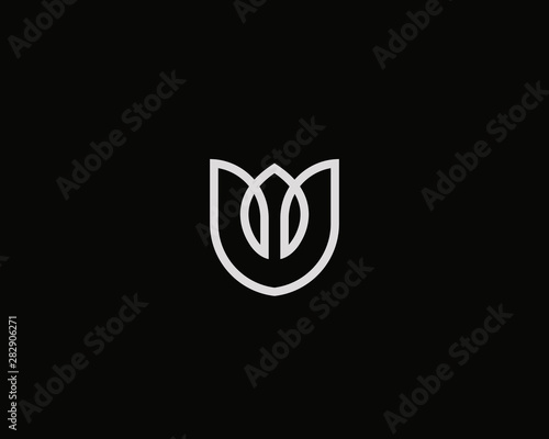 Flower shield vector logo. Linear tulip crown premium icon logotype. #282906271