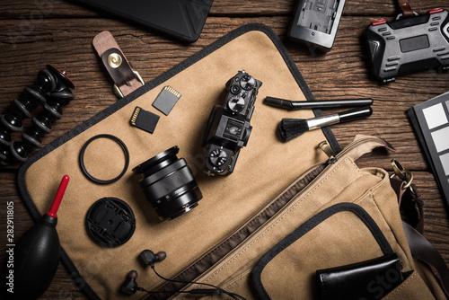 photography gear on wooden table