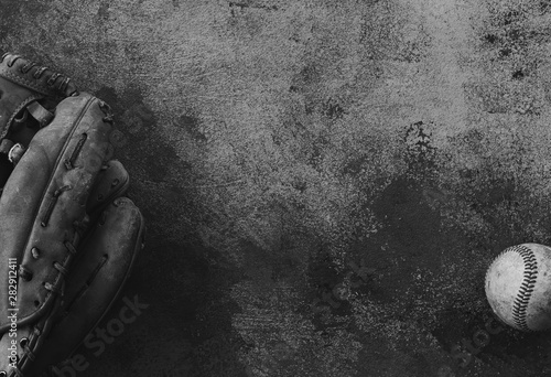 Photography Baseball equipment on grunge texture of concrete, copy space on black and white sports background