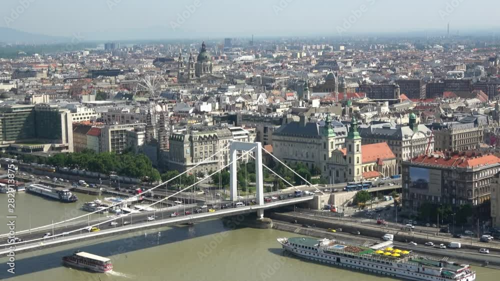 Hungary, Budapest, June 12, 2019. Aerial panoramic view of Budapest and Dubabe river with Elisabeth bridge across. Hungary, Budapest, June 12, 2019. Aerial panoramic view of Budapest and Dubabe river with Elisabeth bridge across.