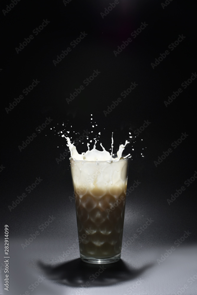 Milk in Splash with black background Milk in Splash with black background