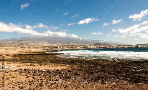 A view of Playa Leocadio Machado beach and El Medano town from Mount Roja nature reserve, Tenerife, Spain