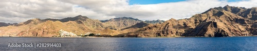 Tenerife coastline panorama with San Andreas village, Playa de Las Teresitas beach and road along Anaga mountains, Canary Islands, Spain