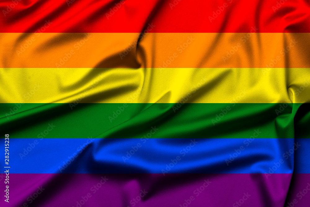 Wavy LGBTQI or LGBT flag as bright rainbow background. Gay pride symbol.