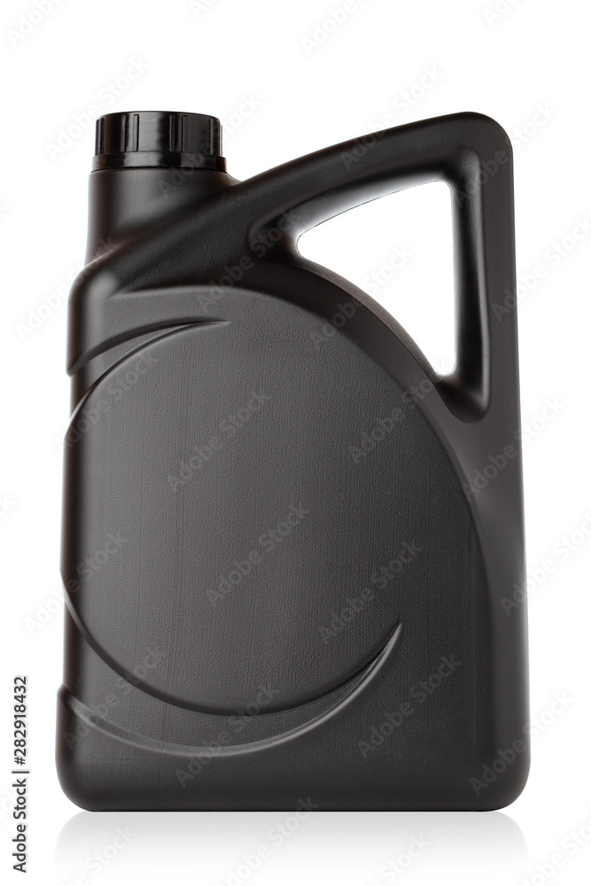 Canister for technical liquids on a white background. Black Canister for automotive oil close-up. Canister for technical liquids on a white background. Black Canister for automotive oil close-up.