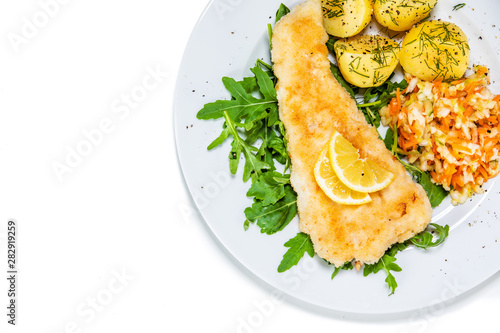Canvas Print Fish dish - fried fish fillet boiled potatoes and vegetables