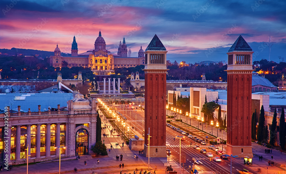 Barcelona, Spain. Nighttime top view at Spanish Square with tower and national palace art museum Catalonia far away.