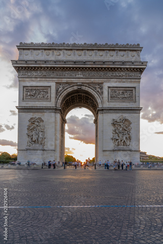 Fototapeta Naklejka Na Ścianę i Meble -  Paris, France - 08 07 2019: Triumphal Arc of Paris at sunset