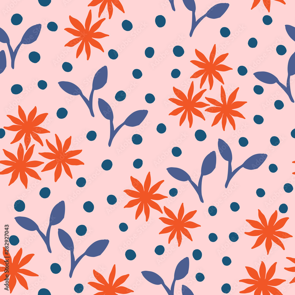 Floral seamless pattern in red and blue on pastel pink background.